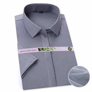 Detail of light gray bamboo fiber short-sleeved business shirt showing fabric texture