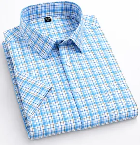Detailed view of short-sleeved 100% cotton plaid shirt in blue and white.