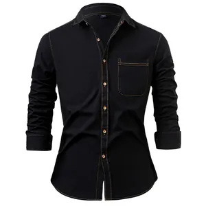 Front view detail of a black men's long sleeve cotton denim shirt with orange stitching
