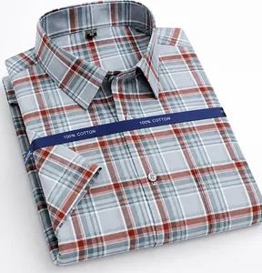 Close-up of a 100% cotton men's short-sleeved plaid shirt with a non-iron finish detail.