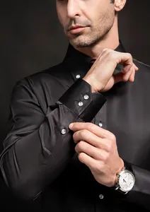 Detailed macro view of black men's business shirt featuring luxury sparkling crystal buttons