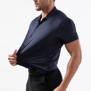 Close-up of men's navy short sleeve polo shirt showing high elasticity and silky fabric