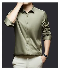 Close-up showing the elegant silk-like satin texture of the olive green dress shirt.