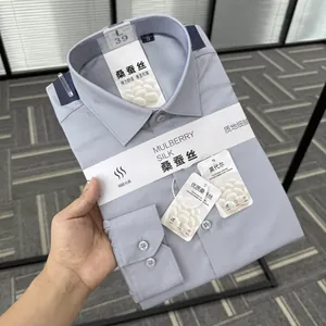 Detailed shot of a folded men's mulberry silk and modal blend formal shirt with tags