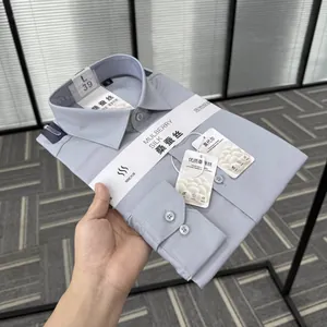 Detail view of folded mulberry silk and modal blend men's dress shirt with tags