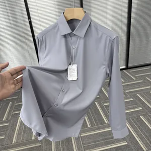 Detailed view of stretch mulberry silk blend fabric on men's grey dress shirt