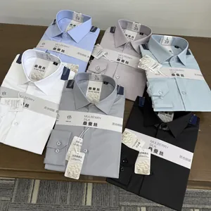 Macro detail of mulberry silk blend men's dress shirts showing various elegant colors.