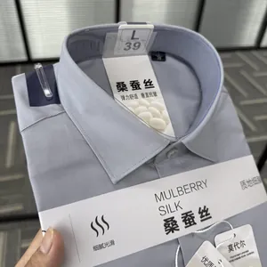 Close-up detail of a mulberry silk and modal blend men's dress shirt with tags