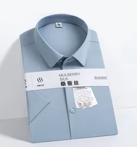 Professional detail of folded light blue mulberry silk short sleeve shirt with brand tag