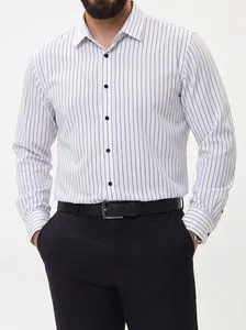 Close-up of men's white long-sleeved shirt with vertical black stripes and buttons.