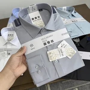 Detail of mulberry silk and modal blend men's dress shirt with premium fabric tags