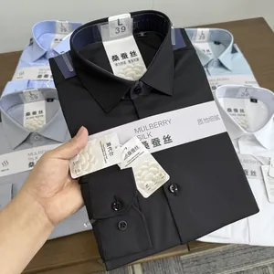 Detailed close-up view of labels on a folded mulberry silk and modal blend shirt