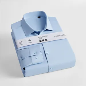 Premium men's light blue long-sleeved mulberry silk blend shirt folded neatly on white.