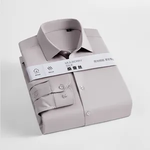 Premium mulberry silk men's long-sleeved shirt in light gray folded neatly