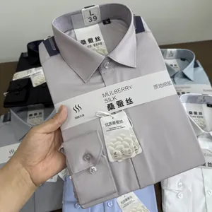 Close-up of a folded mulberry silk blend men's formal shirt with packaging tags