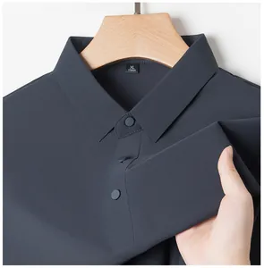 Close-up detail of a dark grey breathable ice silk men's polo shirt with snap buttons
