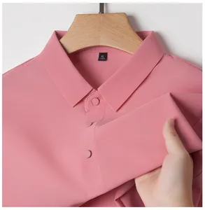 Close-up of pink cooling ice silk polo shirt showing breathable mesh fabric texture