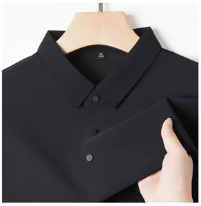 Close-up of black ice silk polo shirt showing breathable fabric texture and lapel collar