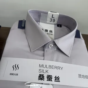 Detailed shot of mulberry silk blend men's dress shirt packaging and size tag