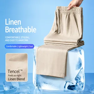 Close-up of breathable men's linen straight trousers displayed on a large ice cube