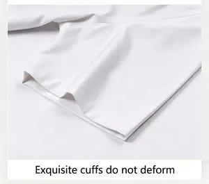 Detailed view of the exquisite stitching on a white bamboo fiber short sleeve shirt cuff