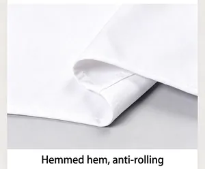 Detailed macro view of the anti-curl hem stitching on a white bamboo fiber shirt.