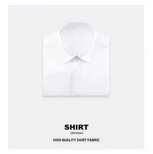 Detail view of a professionally folded white men's dress shirt with premium cotton fabric