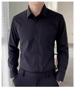 Close-up detail showing the fit and fabric of a professional black long-sleeve business shirt