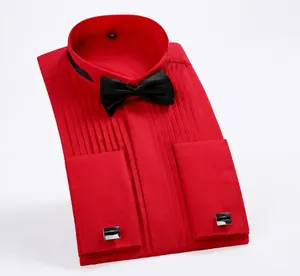 Close-up of red pleated tuxedo shirt with black bow tie and silver cufflinks
