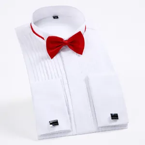 White tuxedo shirt with wing collar, pleated front and red bow tie