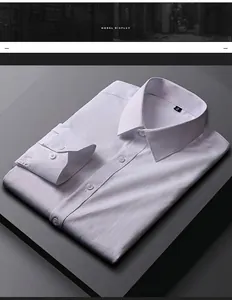 Vue détaillée d'une chemise habillée blanche à manches longues soigneusement pliée