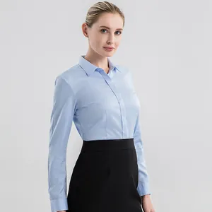 Professional light blue long-sleeved formal shirt for business wear on a model