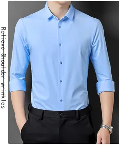 Detailed view showing the fit and fabric of a light blue long-sleeve business shirt