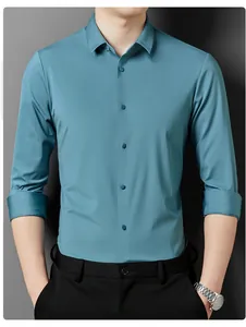 Detailed view of a men's teal business casual shirt with high-elastic non-iron fabric