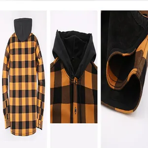 Détails d'une chemise à carreaux à capuche avec doublure polaire et motif orange et noir.