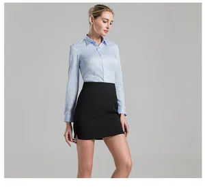 Professional light blue long-sleeve cotton shirt with concealed buttons for women.