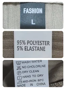 Detail view of clothing labels showing material composition and wash care instructions