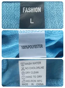 Close-up of 100% polyester fabric label and care instructions for blue waffle shirt.