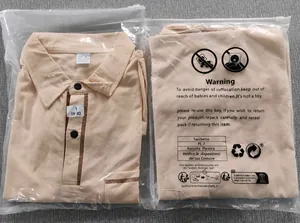 Packaged men's solid color polo shirt in light apricot with pocket detail