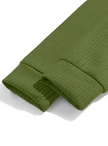 Close-up detail of olive green ribbed knit cuffs on a casual men's knit sweatshirt