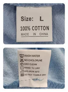 Dettaglio delle etichette in 100% cotone e istruzioni di lavaggio per camicia uomo