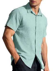 Detail of men's summer linen short-sleeved casual shirt in light mint green texture