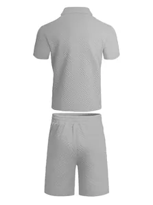 Back view of men's gray short-sleeve shirt and shorts set featuring waffle texture.