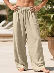 Men's breathable linen-blend casual wide-leg pants with drawstring waist in a resort setting