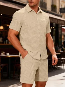 Detail of men's beige jacquard shirt set with textured geometric pattern in cafe setting