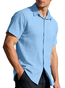 Detail shot of men's light blue linen short sleeve shirt with breathable texture.