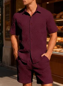 Close-up view of men's burgundy jacquard shirt and shorts set in casual outdoor setting
