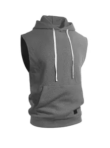 Detailed shot of grey jacquard knit hooded vest showing fabric texture and drawstring.