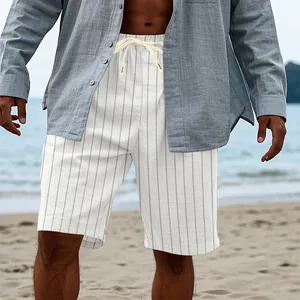 Close-up detail of men's summer vertical striped linen-style casual shorts on beach