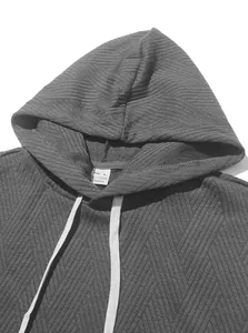 Close-up of jacquard knit texture and drawstring on men's grey sleeveless hoodie